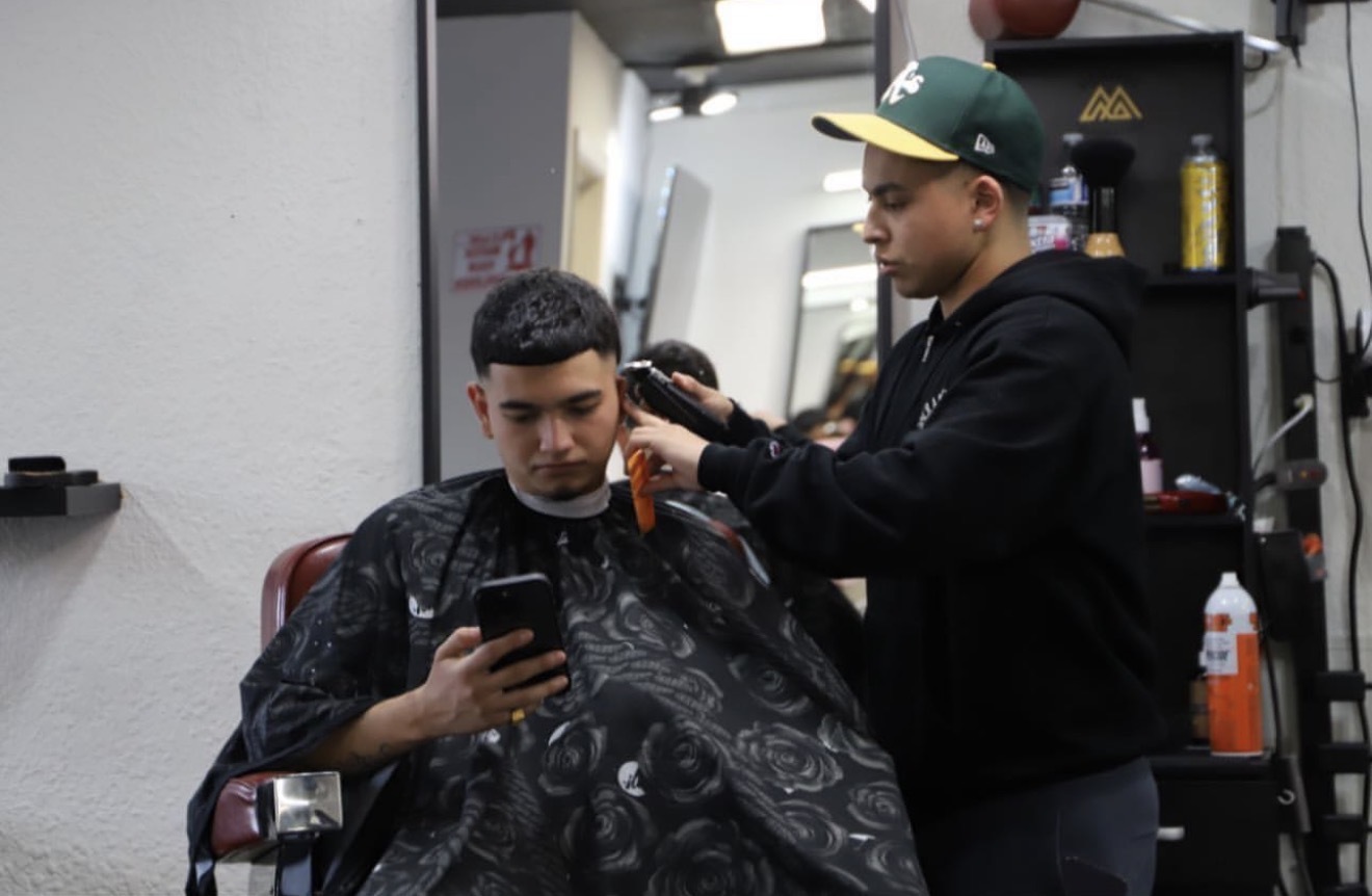 Javier Lopez cutting hair at Javistylz barbershop Richmond CA